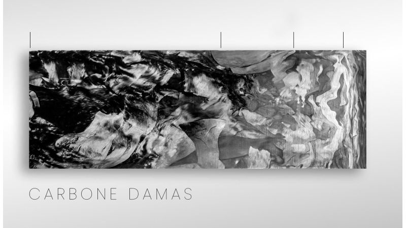 Carbone damas - Gros fragment de carbone et résine époxy