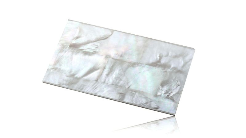 White mother-of-pearl plate reconstituted