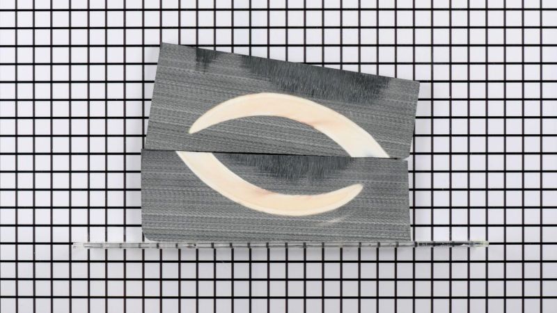 Unpolished stabilized warthog tusk handle - black resin