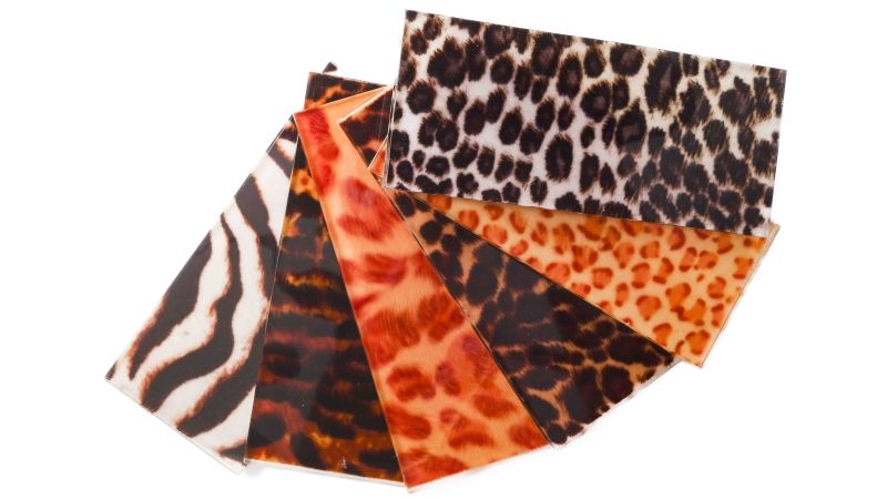 Fur" fabric inclusion plate